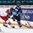 KAMLOOPS, BC - APRIL 1: Czech Republic's Katerina Flachsova #4 and Finland's Sari Karna #20 battle for the puck during quarterfinal round action at the 2016 IIHF Ice Hockey Women's World Championship. (Photo by Matt Zambonin/HHOF-IIHF Images)

